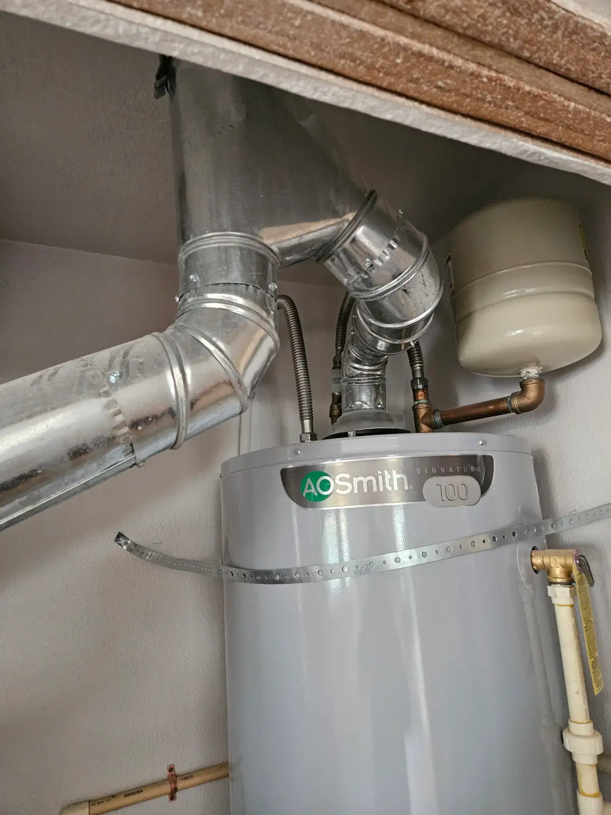 Tank water heater installation with venting and expansion tank by Armor Heating & Cooling